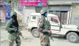  ?? ANI ?? Security personnel near the encounter site in Kulgam on Saturday.