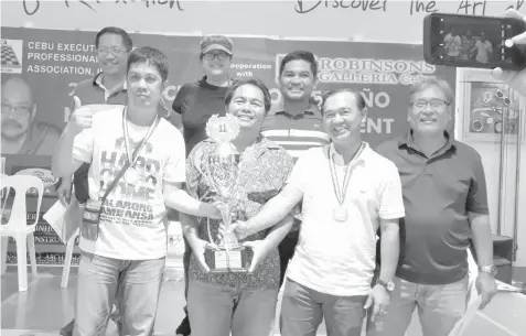  ??  ?? Front row from left, CEPCA-A team members NM Rogelio Enriquez Jr., NM Arnold Cadiz, Atty. Jong Melendez, and with tournament director Jun Olis. Second row from left, Ruel Hortelano, Zarah Smith Pestaño, and CEPCA President Engr. Jerry Maratas.