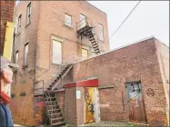  ?? Contribute­d photo ?? The Meara building, locally known as the Howard building on Main Street, once a popular shoe and clothing store, has stood empty for years. This week, gallery owner John Noelke purchased the building, pictured here from the rear of the property.