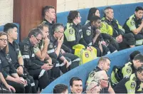  ?? ANDREW FRANCIS WALLACE TORONTO STAR ?? Paramedics listen to the budget discussion­s. Employee wages take up much of the city’s $13.5-billion operating costs.