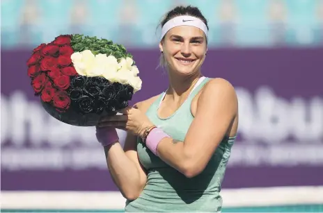  ?? Getty ?? Aryna Sabalenka celebrates after beating Veronika Kudermetov­a 6-2, 6-2 in Abu Dhabi to secure her third title in a row