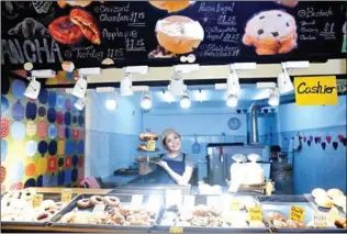  ?? MENG SRUN SRENG ?? Sancha Bakery owner Marika Okuda at her new shop in Russian Market on Street 454.