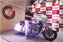  ??  ?? Pankaj Dubey, country head and MD, Polaris India with the Chieftain