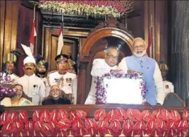  ?? PTI PHOTO ?? President Pranab Mukherjee and Prime Minister Narendra Modi press a button to launch the GST at a special midnight ceremony in the central hall of Parliament.