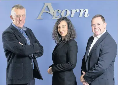  ??  ?? > Andrew Tugwell, from Acorn, left, with Sinead Johnson and Paul Williams, from Lloyds Bank