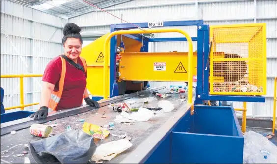  ?? Photo / Supplied ?? Recycler Autumn Tonihi coming to grips with the new Metallic Sweeping Ltd recycling sorting centre in Te Awamutu.