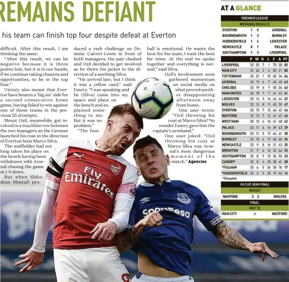  ?? AFP PIC ?? Arsenal’s Aaron Ramsey (left) and Everton’s Lucas Digne vie for the ball at Goodison Park on Sunday.