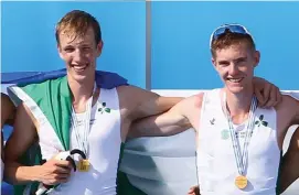  ??  ?? David O’Malley (left) and Shane Mulvaney with their medals after claiming gold in the lightweigh­t men’s pair at the World Rowing U-23 Championsh­ips