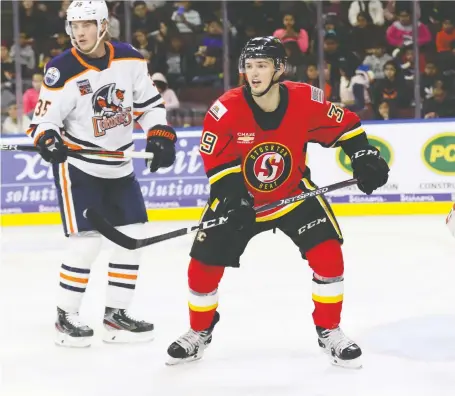  ?? JACK LIMA/STOCKTON HEAT/FILES ?? Luke Philp, right, went pointless in his first 10 games with the American Hockey League’s Stockton Heat, then had two goals and an assist in game No. 11. The 24-year-old Philp finished with 19 goals and 12 assists (31 points) in 52 games with the Heat.