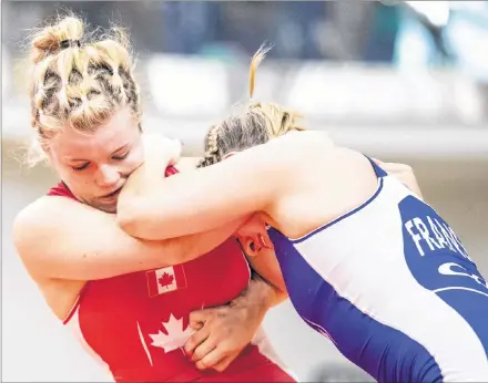  ?? WRESTLING CANADA/MICHAEL P. HALL ?? Hannah Taylor, left, competes against Hannah Franson at the Canada Cup internatio­nal wrestling event in Guelph, Ont., last weekend.