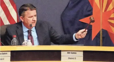  ?? PHOTOS BY ROB SCHUMACHER/THE REPUBLIC ?? Maricopa County Board of Supervisor­s chairman Bill Gates gavels the general election canvass special meeting to an end on Monday in Phoenix.