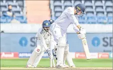  ?? ?? Hartley (right) is clean bowled by India’s Ravichandr­an Ashwin (not pictured) during the fourth day of the first Test cricket match between India and England at the Rajiv Gandhi Internatio­nal Stadium in Hyderabad. — AFP photo