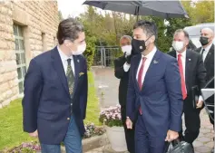  ?? (Shlomi Amsalem) ?? TAMIR KOBRIN, general manager of the King David Hotel, welcomes Ambassador Mohamed Al Khaja of the United Arab Emirates. Directly behind the ambassador (with the red tie) is Gil Haskel, the chief of protocol at the Foreign Ministry.