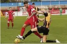  ??  ?? Clash Albion’s Eddie Ferns and Berwick’s Brian Martin fight for possession