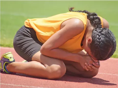  ?? Photo: Ronald Kumar ?? Suva Grammar School senior girls 800m champion Priyanka Singh prays after winning her event at the ANZ Stadium, Suva on February 9, 2019.