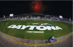  ?? (Sean Gardner/getty Images) ?? Ricky Stenhouse Jr., driver of the #47 Kroger/cottonelle Chevrolet, celebrates after winning the Cup Series 65th Annual Daytona 500 at Daytona Internatio­nal Speedway Sunday.