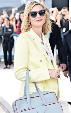  ??  ?? Cate Blanchett arrives at Cannes yesterday. Far left, Nicole Kidman, and left, Sean Penn with Charlize Theron, who faced criticism at their premieres