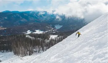  ?? Christian Murdock, The Gazette ?? A skier enjoys the fresh snow on Alberta Face on Oct. 13 as Wolf Creek Ski Area became the first Colorado resort to open for the 2018-2019 ski season.