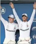  ??  ?? Bottas y Hamilton.