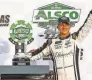  ?? AP ?? Less than a month into his first full-time season since 2018, AJ Allmending­er collected a trophy in Las Vegas for Kaulig Racing.