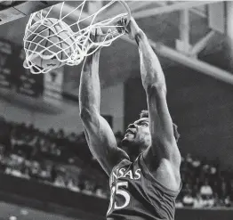  ?? John E. Moore III / Getty Images ?? Kansas center Udoka Azubuike posted 15 points ands 11 rebounds in a win over Texas Tech as the Jayhawks clinched the Big 12 regular-season title Saturday.