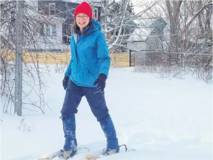  ?? BRIAN MRKONJIC ?? Janet Barlow, executive director of Hike Nova Scotia, says snowshoein­g is an easy-to-learn hobby that allows people to get outside during winter.