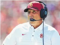  ?? Harry How / Getty Images ?? Clay Helton has won 11 consecutiv­e games at USC.