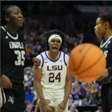  ?? Gerald Herbert/Associated Press ?? LSU guard Aneesah Morrow, center, reacts after being fouled during the first half of the first-round game against Rice in the women’s NCAA tournament in Baton Rouge, La. on Friday.