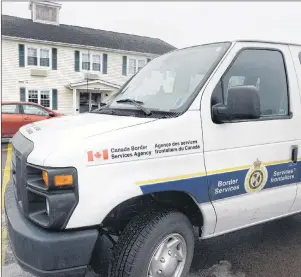  ?? GUARDIAN FILE PHOTO ?? A Canadian Border Services van sits outside the Sherwood Motel in this 2016 file photo.