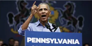  ?? MATT ROURKE — THE ASSOCIATED PRESS ?? Former President Barack Obama speaks as he campaigns Friday in support of Pennsylvan­ia candidates in Philadelph­ia.