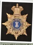  ??  ?? A beautiful specimen of a pre-1881 officer’s helmet plate to the 1st or Royal Scots Regiment of Foot. One of the few that did not include a number