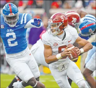  ?? Thomas Graning
The Associated Press ?? Alabama QB Bryce Young looks to pass in the 10th-ranked Crimson Tide’s 30-24 SEC win over No. 11 Ole Miss in Oxford, Miss., on Saturday.