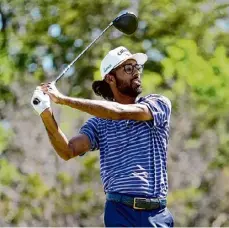  ?? Raj Mehta/getty Images ?? Akshay Bhatia plays his tee shot on the fourth hole during the second round of the Valero Texas Open at TPC San Antonio on Friday.