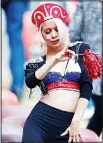  ??  ?? A Russian soccer fan dances ahead of the Group A match between Russia and Saudi Arabia which opens the 2018 soccer World Cup at the Luzhniki Stadium in Moscow,
Russia on June 14. (AP)