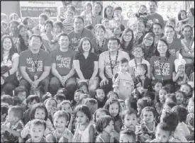  ??  ?? Photo shows the Robinsons Town Mall Malabon with parents and recipient children of the supplement feeding program from Barangay Catmon. Seated are (middle row, 2nd from left) Ralph Basinal, Robinsons Mall operations officer; Darwin Renolayan, Robinsons...