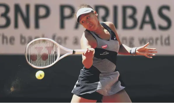  ??  ?? 0 Naomi Osaka was fined and threatened with expulsion from the Roland Garros tournament just for avoiding the media
