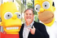  ??  ?? In this file photo Cartoonist Matt Groening, creator of “The Simpsons,” poses with his characters Bart (left) and Homer Simpson as he is honored with the 2,459th star on the Hollywood Walk of Fame in Hollywood. –AFP