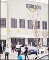  ?? (AP) ?? Workers at Amazon’s fulfillmen­t center in Staten Island, N.Y., protest work conditions in the company’s warehouse, on March 30, in New York.