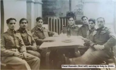  ?? ?? Fazal Hussain (first left) serving in Italy in 1944.