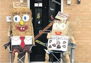  ??  ?? ●● Last year’s Helmshore Scarecrow Trail saw Spongebob Squarepant­s on Cotton Tree Way