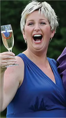  ??  ?? Big prize: Bayford celebratin­g her lottery win in 2012