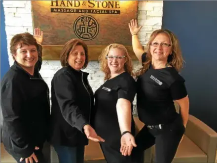  ?? GARY PULEO — DIGITAL FIRST MEDIA ?? Celebratin­g the opening of Hand & Stone in Blue Bell are, left to right, manager Renee Manzo, owner Denise Vizzini, spa associate Jacqueline Pysock and massage therapist Jax Nye.