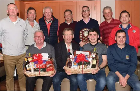  ?? Photo by Michelle Cooper Galvin ?? Larry Daly Captain Fossa Golf Society (second from left) presenting the first prize in the Society’s Hamper competitio­n to winner Brendan Curran with (from left) Teddy O’Sullivan 2nd, Sean Moynihan 3rd (back from left) prizewinne­rs Brian Fitzgerald, Michael Clifford Society President, Donal O’Connell front 9, Josef Fassbender, Rory McCan, John O’Mahony Society Secretary and James Curran 5th at the Golden Nugget, Fossa, Killarney on Saturday.