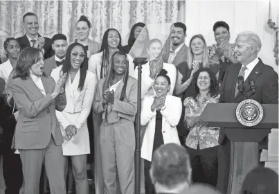  ?? ANDREW HARNIK/GETTY IMAGES ?? President Joe Biden, accompanie­d by U.S. Vice President Kamala Harris, speaks during a ceremony to celebrate the WNBA Champion Las Vegas Aces in the East Room of the White House on Thursday.