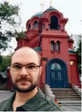 ??  ?? Nathan Bennett in front of the Church of the Intercessi­on of the Mother of God in Harbin, arbin, northeaste­rn China. courtesy of the author