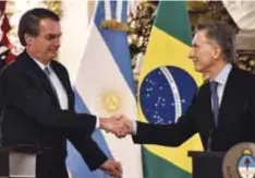  ?? |GETTY IMAGES ?? Jair Bolsonaro, presidente de Brasil, y Mauricio Macri, presidente de Argentina, durante la primera visita de Estado del brasileño a Argentina el pasado 6 de junio.