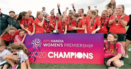  ?? GETTY IMAGES ?? Canterbury United Pride players celebrate after winning their third straight ISPS Handa Women’s Premiershi­p final.