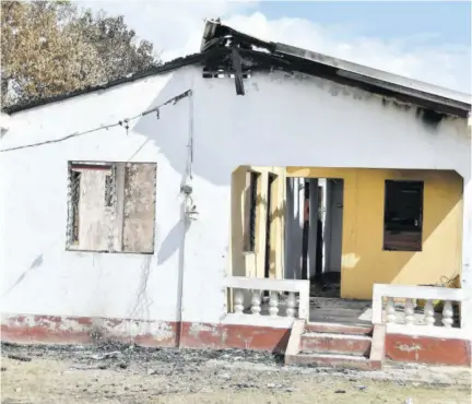  ?? (Photo: Garfield Robinson) ?? This is the house in Cornpiece Settlement in Clarendon which was allegedly set ablaze by a man of unsound mind who residents refer to as ‘Matthew’.