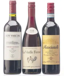  ?? TONY CENICOLA/THE NEW YORK TIMES ?? From left, Los Vascos Colchagua Valley Cabernet Sauvignon 2018, La Vieille Ferme Vin de France Red 2019 and Masciarell­i Montepulci­ano d’Abruzzo 2018. Once you get below $10 for a bottle of wine, compromise­s are inevitable.