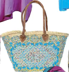  ??  ?? Moroccan market baskets with handstitch­ed design and Pashmina shawls with embroidery
